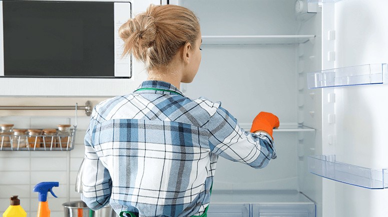 woman-cleaning-fridge-3